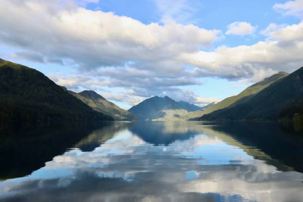 istock Sun And Clouds Over Lake Crescent In Olympic National Park 1397428115