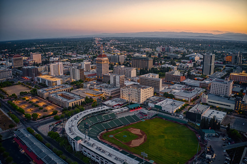 Aerial shot of downtown Boise, Idaho in pre-dawn twilight.\n\nAuthorization was obtained from the FAA for this operation in restricted airspace.