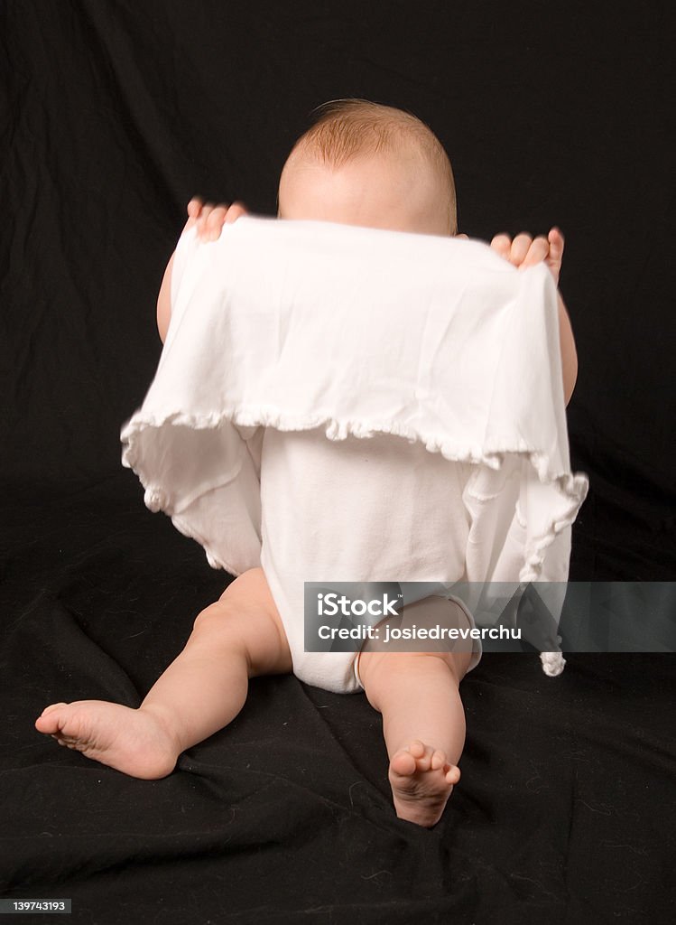 peek-a-boo Cute little baby girl playing peek-a-boo with the photographer. Peekaboo - Game Stock Photo