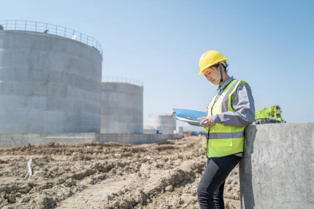 istock A Chinese female construction engineer checks data on an unfinished construction site 1397432534