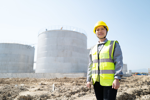A Chinese female engineer inspected the construction on the construction site