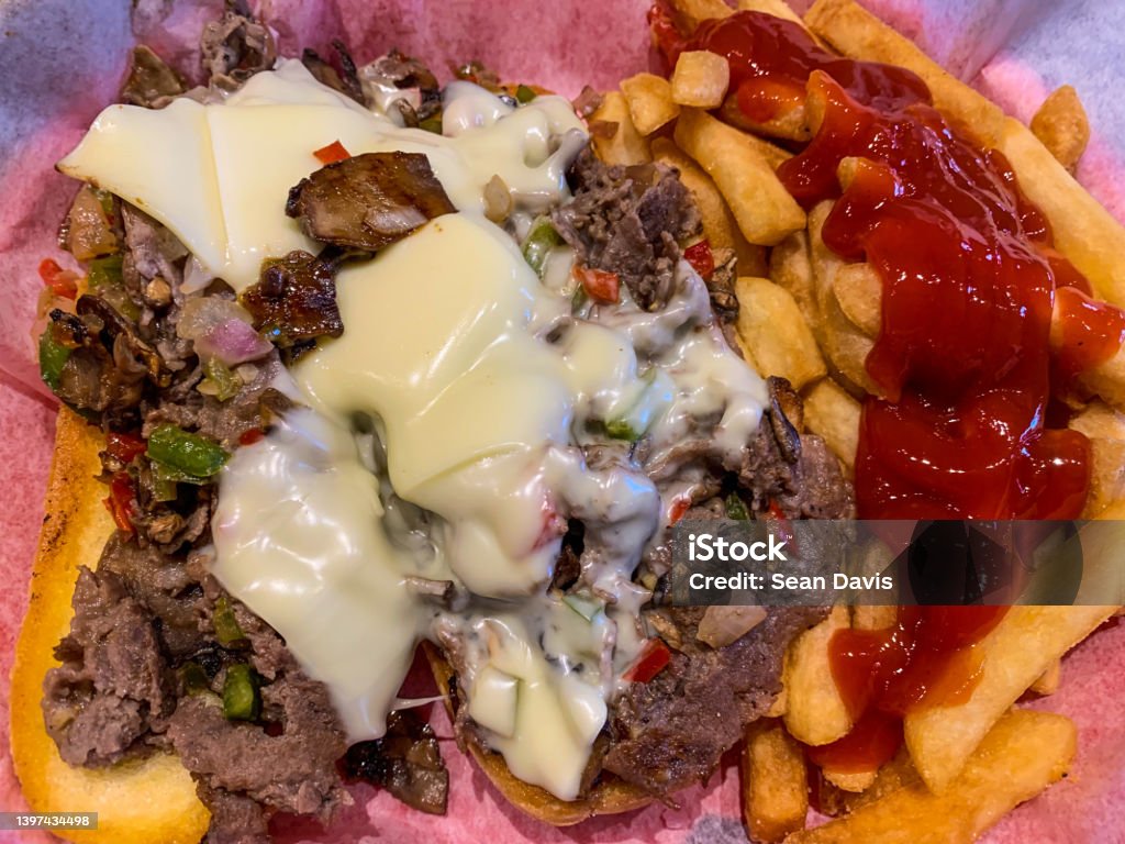 Philly Cheesesteak with French Fries Overloaded Philly Cheesesteak with French Fries Cheese Stock Photo