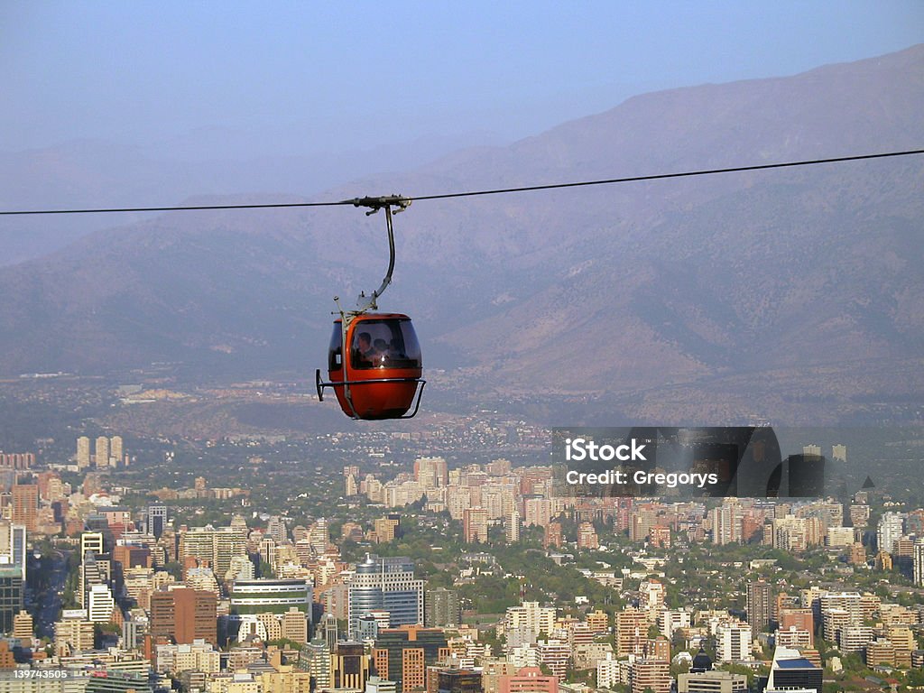 Red Cable Lift over Santiago de Chile Cable car over Santiago de Chile. Above Stock Photo