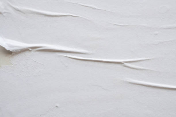 istock white crumpled and creased paper poster texture background 1397435609