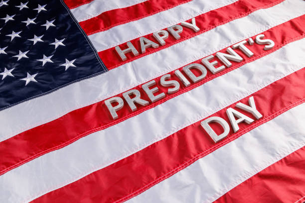 istock words happy presitdents day laid with real letters on US flag surface 1397435776