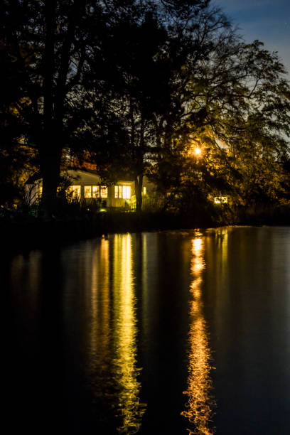 Broomes Island, Maryland The lights of a house reflected in the Patuxent river waters.