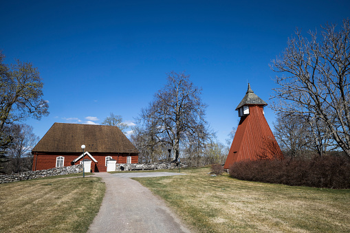 Olsztynek, Poland - August 31,2019:Early 20th century farmhouse with arcade extension, partly half timbered wall and thatched roof, Warmian-Masurian Voivodeship, Poland