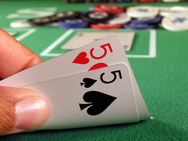 Pocket Fives Two fives as a starting hand in a game of texas hold em. number 58 stock pictures, royalty-free photos & images