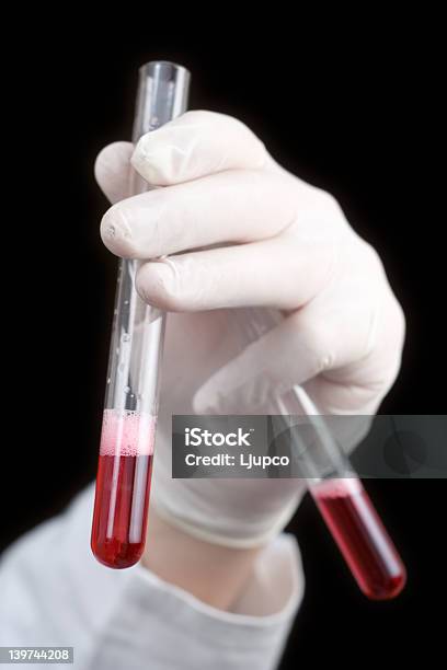 Medical Worker Holding Blood Samples Stock Photo - Download Image Now - Analyzing, Biological Cell, Biology