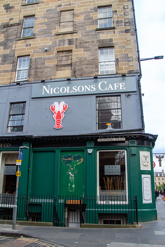Edinburgh, Scotland, United Kingdom - April 26, 2022: View of Nicolsons Cafe in old town Edinburgh, Scotland.