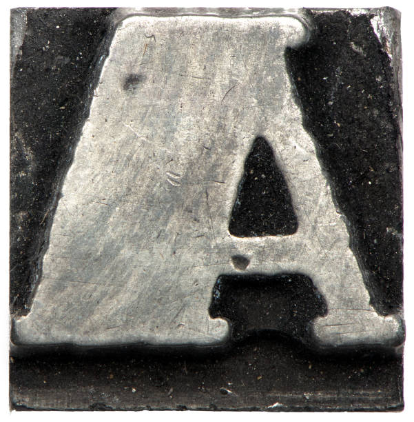 istock close up metal lead letter A white background 1397442943