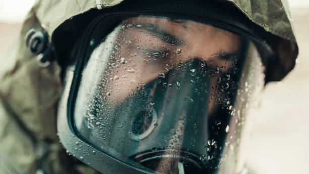 Spooky man wearing gas mask