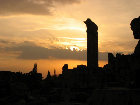 Baalbek temple complex pillar sillouette with sunset