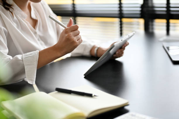 istock Close-up image, Female assistant or secretary working at her office desk workspace 1397452652