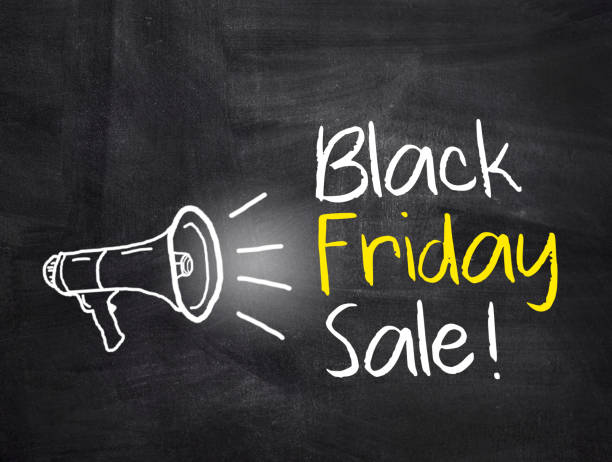 istock Black Friday Sale text with megaphone on chalkboard background. 1397455994