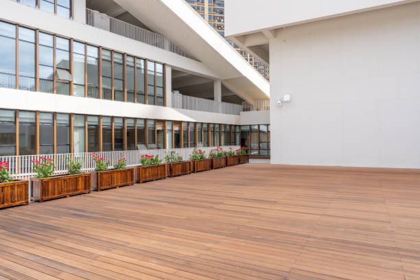 An empty wooden square and surrounding buildings