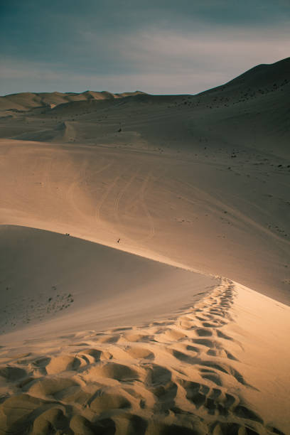 istock The path through the dunes, Dunhuang, Gansu, China 1397462225