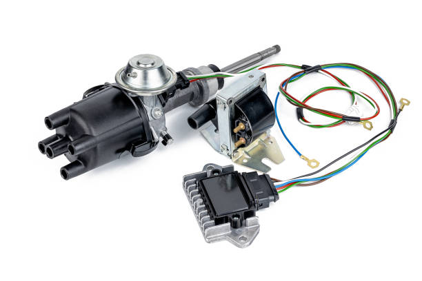 istock ignition system part kit for car installation isolated on white background. ignition distributor, ignition coil and module cut out 1397464578