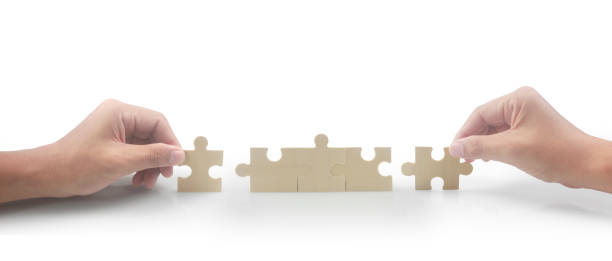 Connecting jigsaw puzzle. Business solutions success stock photo