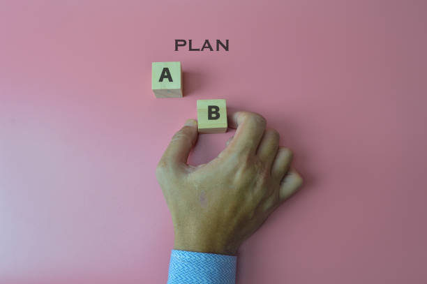 istock Hand of businessman choosing plan B. Business concept. 1397467821