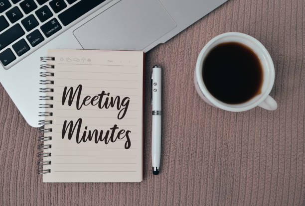istock Notebook written with text MEETING MINUTES. Top view. 1397468110