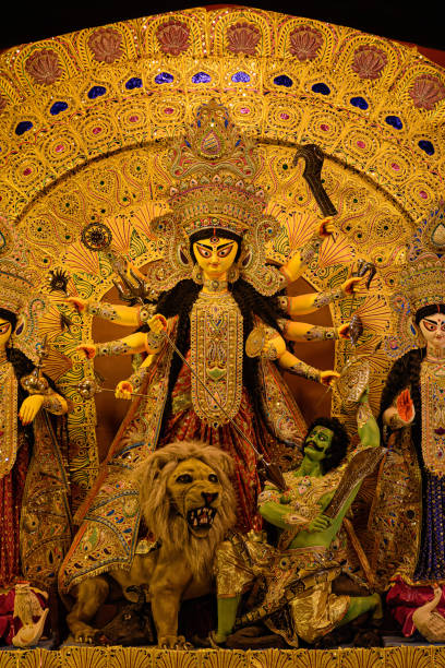 istock Goddess Durga devi idol decorated at puja pandal in Kolkata, West Bengal, India. Durga Puja is biggest religious festival of Hinduism and is now celebrated worldwide. 1397469908