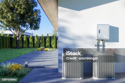 istock Close-up View Of Air Conditioning Outdoor Units In The Backyard 1397470041