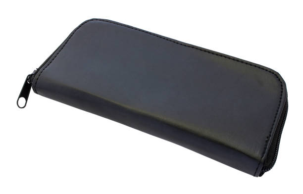 istock Black leather makeup bag isolated on white background 1397470989