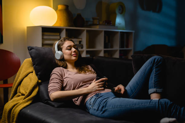 istock woman relaxing at home 1397471753