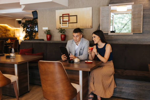 istock Business couple on coffee break 1397472323