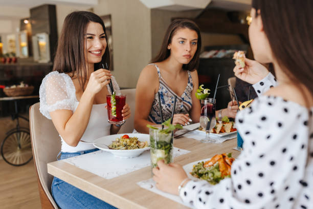 istock Enjoying lunch with girlfriends 1397473175