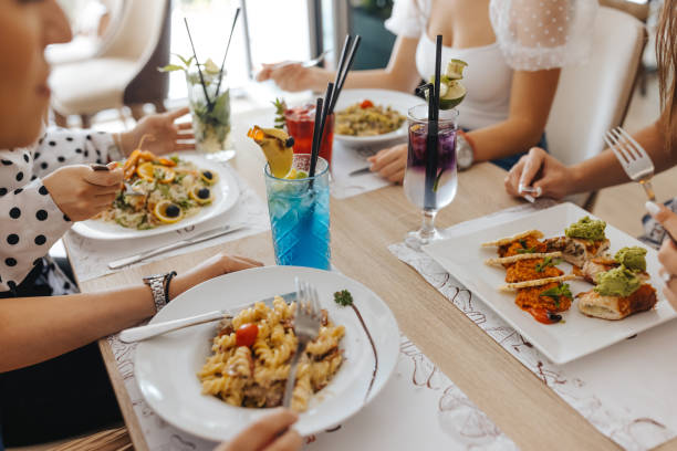 istock Enjoying lunch with girlfriends 1397473239