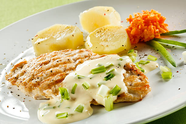 istock Grilled meat with side of vegetables on white plate  139747585