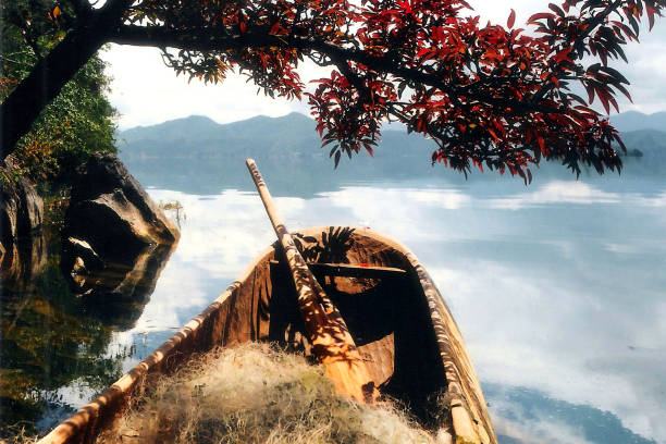 istock 1999s,Canoe on Lugu Lake 1397476170