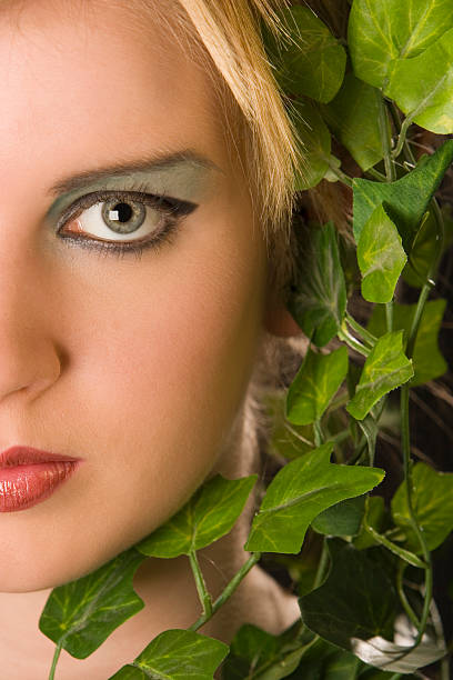 istock Part of a face covered in leaves 139747703