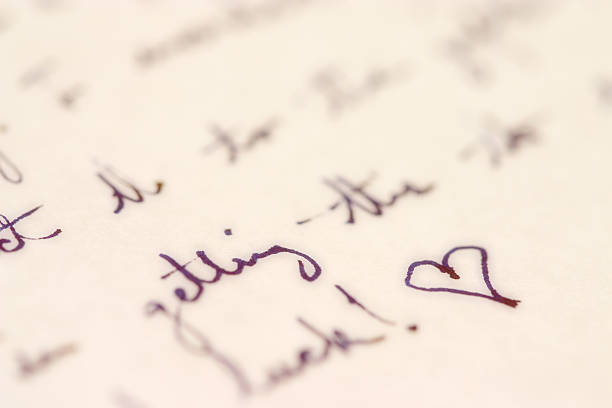 Handwriting with heart stock photo