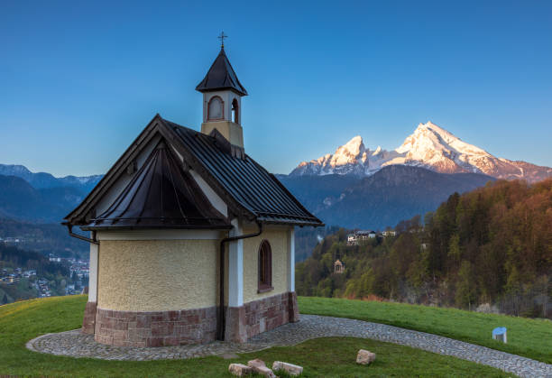 Dawn at Kirchleitn chapel in front of Watzmann mountain, Berchtesgaden, Germany
