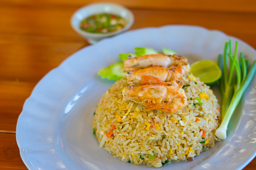 Unique style Thai shrimp fried rice serves on the dish the image isolated