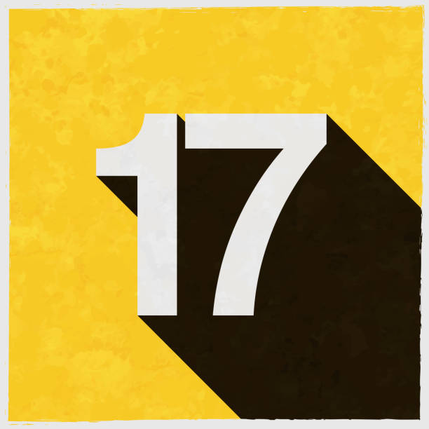 17 - Number Seventeen. Icon with long shadow on textured yellow background Icon of "17 - Number Seventeen" in a trendy vintage style. Beautiful retro illustration with old textured yellow paper and a black long shadow (colors used: yellow, white and black). Vector Illustration (EPS10, well layered and grouped). Easy to edit, manipulate, resize or colorize. Vector and Jpeg file of different sizes. number 17 stock illustrations