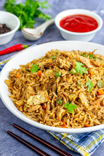 istock Asian Fried Rice with Condiments Verical Photo 1397479533