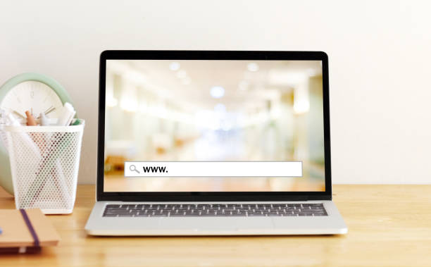 istock Laptop computer with www. on search bar over blur store background on screen, on line shopping ,business, E-commerce, technology and digital marketing concept background 1397480745