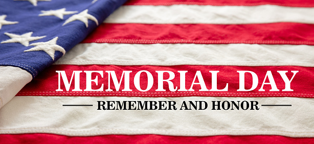 Memorial Day Remember and Honor text on USA flag. Happy Memorial Day Background. America National holiday honoring all veterans who served