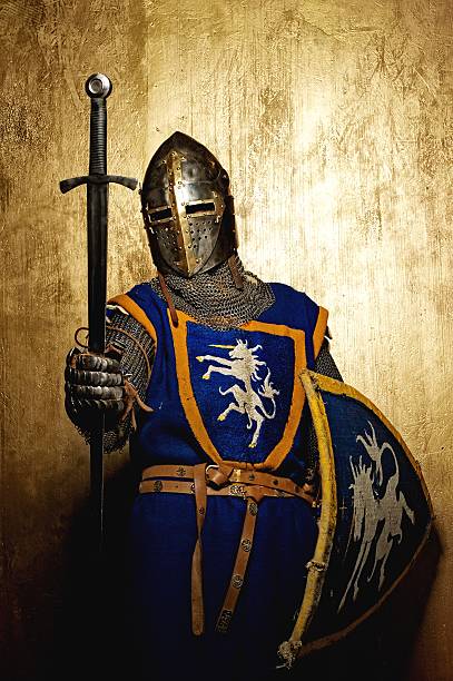 istock Medieval knight on golden background. 139748089