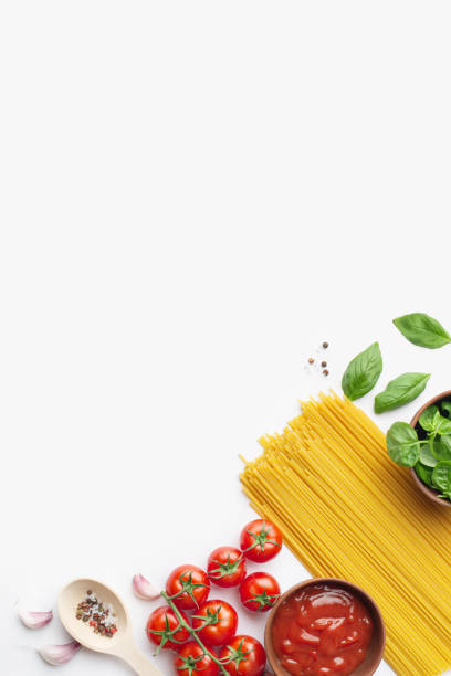 istock Culinary background with ingredients for cooking pasta with tomatoes on a white background 1397481181
