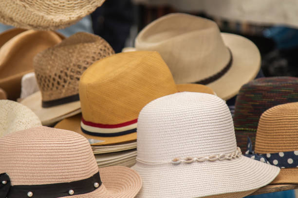 istock lady and gentleman summer hats on stand 1397482038