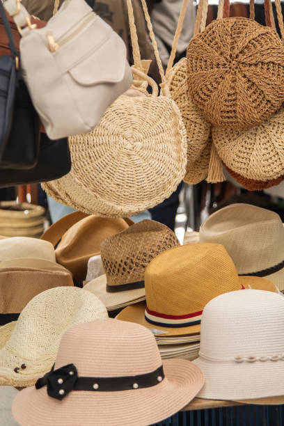 istock bags and hats on market stand 1397482039