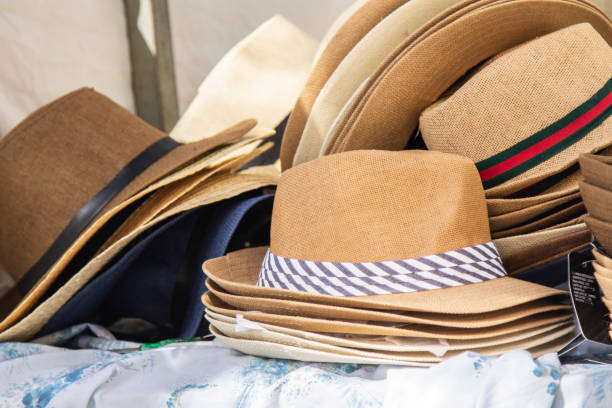 istock lady and gentleman summer hats on stand 1397482053