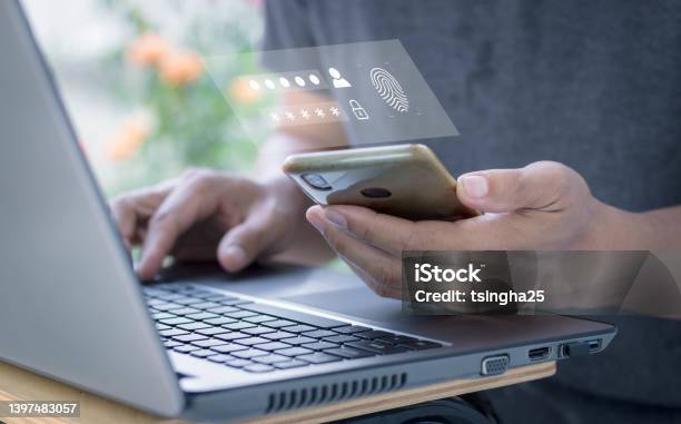 Twostep Verification Authorization For Banking Online Secure Login Access Sms Code Security Confirmation Man Using Laptop Checking Smartphone Concept Cyber Security Safe Data Protection Business Stock Photo - Download Image Now