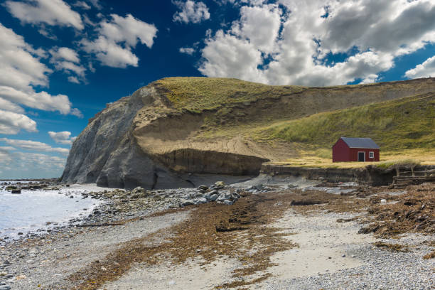 Fisherman's cottage near the coast in Tierra del Fuego Red fisherman's cottage near the coast in the small village Cameron. Tierra del Fuego, Chile cameron montana stock pictures, royalty-free photos & images