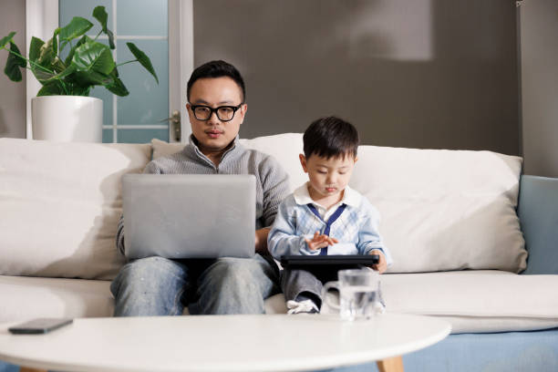 istock Asian men work at home with their sons 1397485713